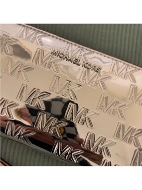 Michael Kors🌸 Silver Embossed MK Logo Clutch
